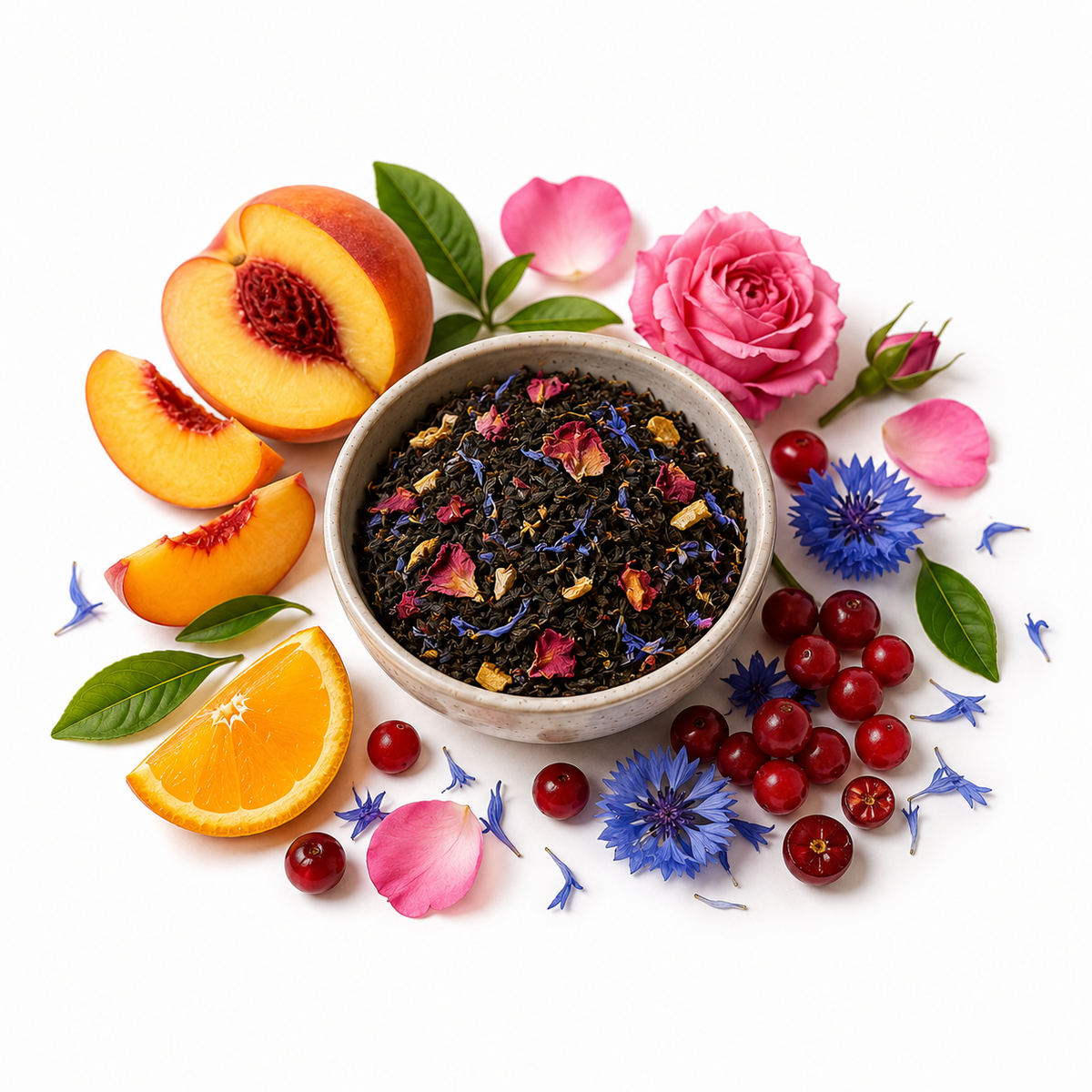 A bowl of loose herbal tea surrounded by fresh peach slices, an orange slice, pink roses, red berries, blue flowers, and green leaves on a white background.