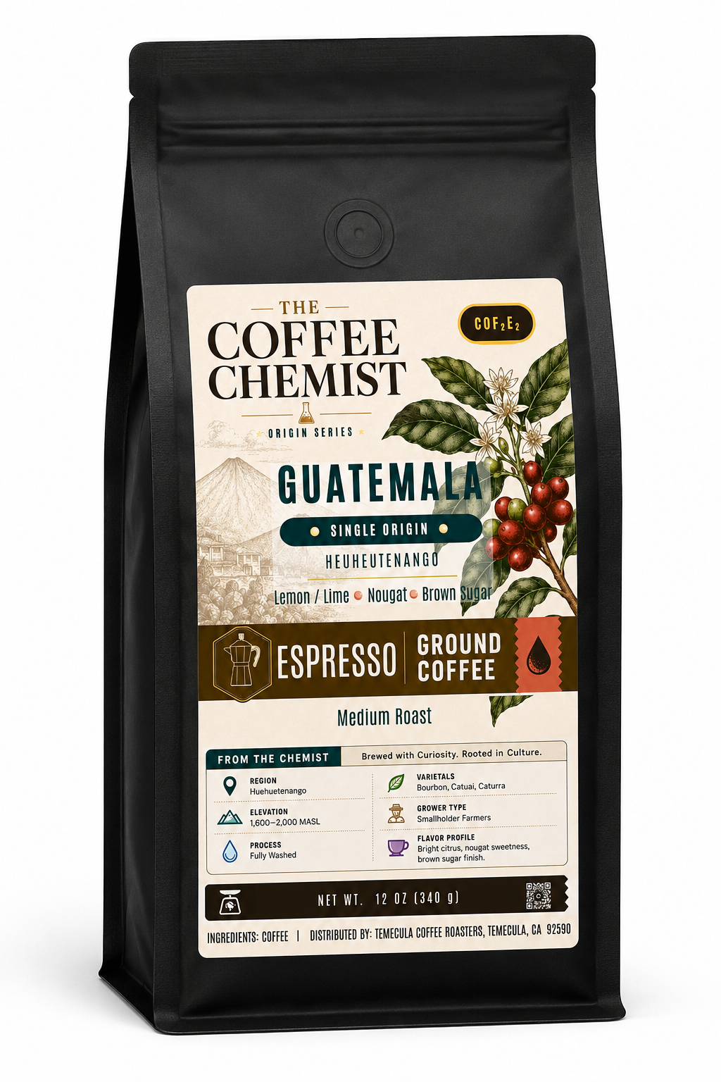 A black stand-up bag of The Coffee Chemist Guatemala single-origin espresso ground coffee, medium roast, with a large cream and green label showing coffee cherries and product details.